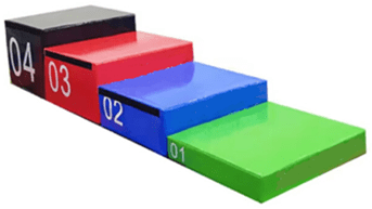 Colorful soft plyo boxes for fitness training in a gradient arrangement.