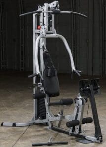 Home gym equipment in a dim room.