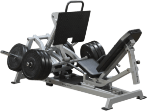 Leg press machine with weights, black background.
