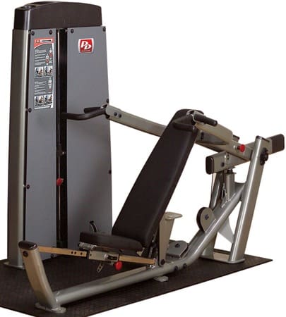 Incline chest press gym machine, side view.