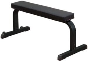 Black flat weight bench for exercise.