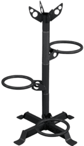 Black metal umbrella stand with multiple holders.