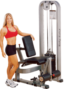 Woman with leg press exercise machine.