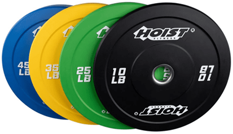 Colorful weight plates stacked in a row.