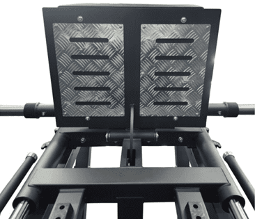 Close-up of an adjustable leg press footplate on gym equipment.