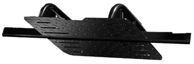 Close-up of a textured, black rubber sole with tread patterns.