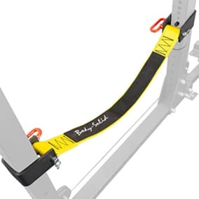 A black and yellow safety strap attached to a metal frame.