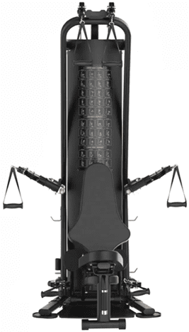 Close-up of a black exercise machine with resistance bands and handles.