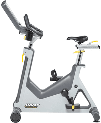 Modern stationary exercise bike with digital display and adjustable seat.