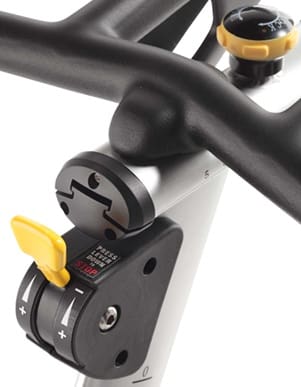 Close-up of a gear shifter on a bicycle handlebar.