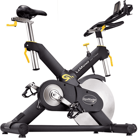 Modern indoor stationary exercise bike with aerodynamic design and adjustable features.