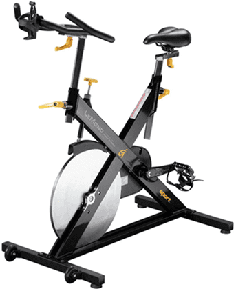 Black and yellow stationary exercise bike with digital display.