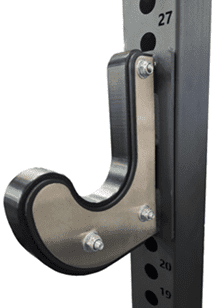Close-up of a metal hook attached to a black vertical surface.