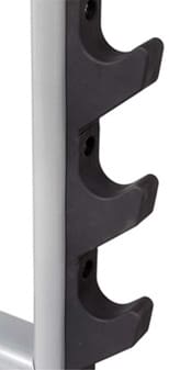 Adjustable incline weight bench with barbell and weight plates.