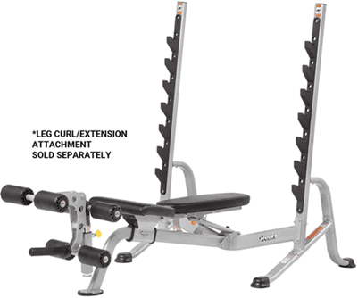 Adjustable incline weight bench with barbell and weight plates.