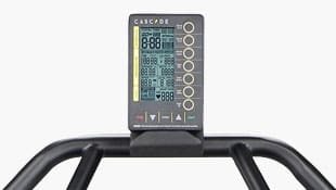 Digital display panel of an exercise machine showing workout stats.